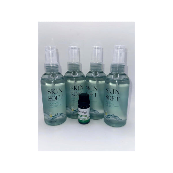 Four bottles of Avon Skin So Soft Original Dry Oil Spray with a small citronella oil bottle for outdoor protection
